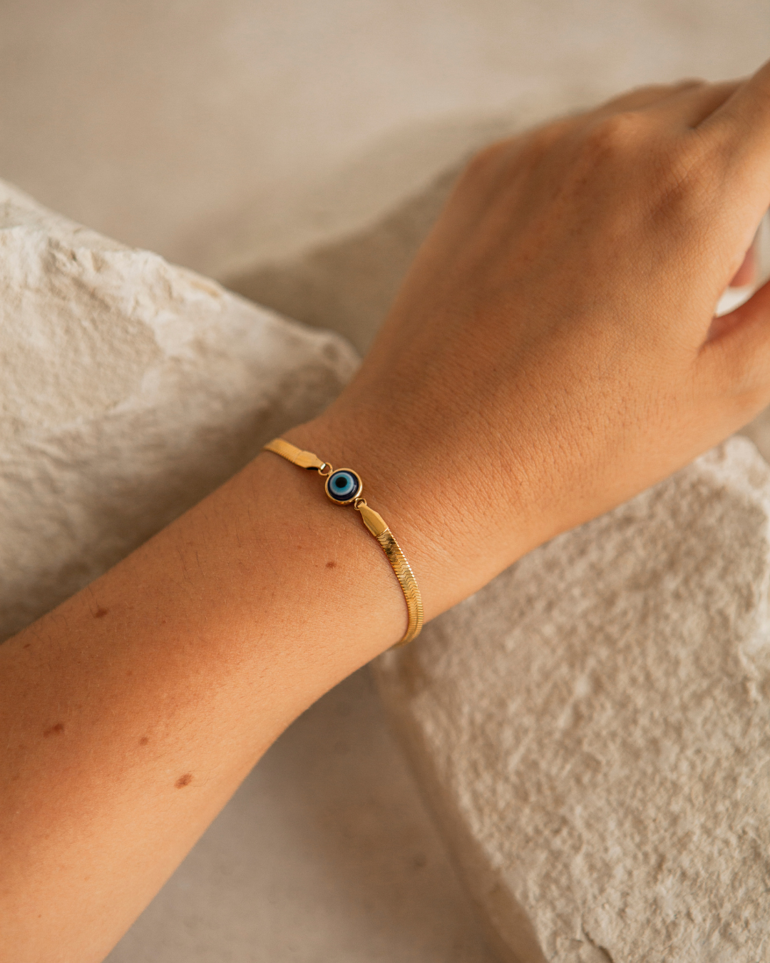 Around which hand should you wear an evil eye bracelet?